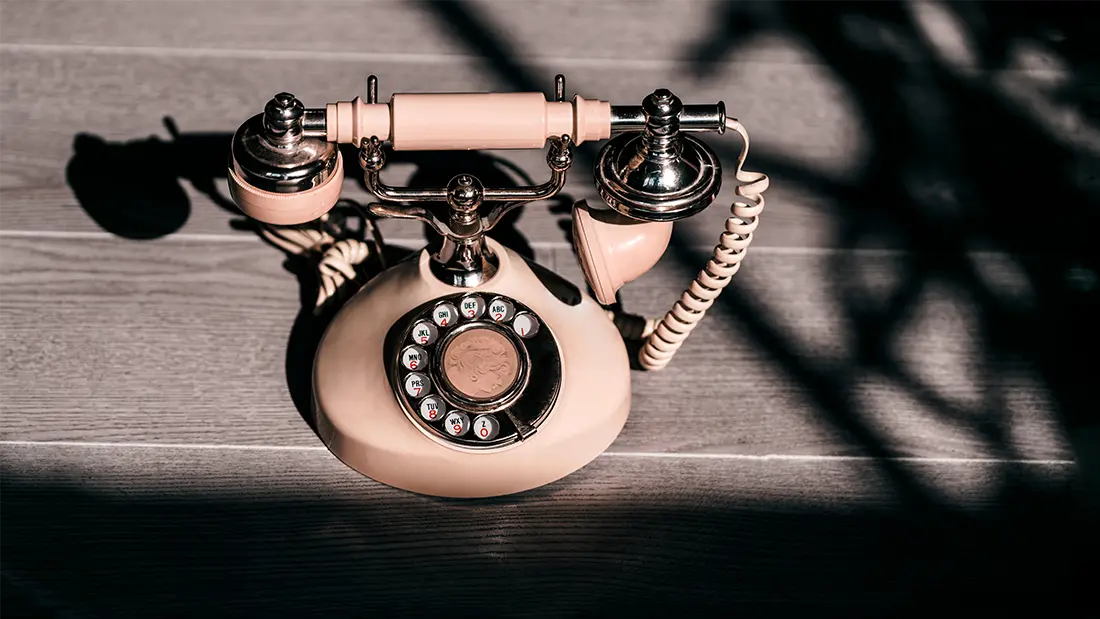 Vintage phone representing UX outsourcing