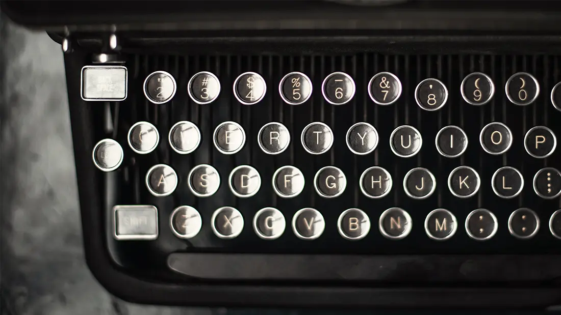 Letter Keys On A Typewriter to illustrate UX Writing